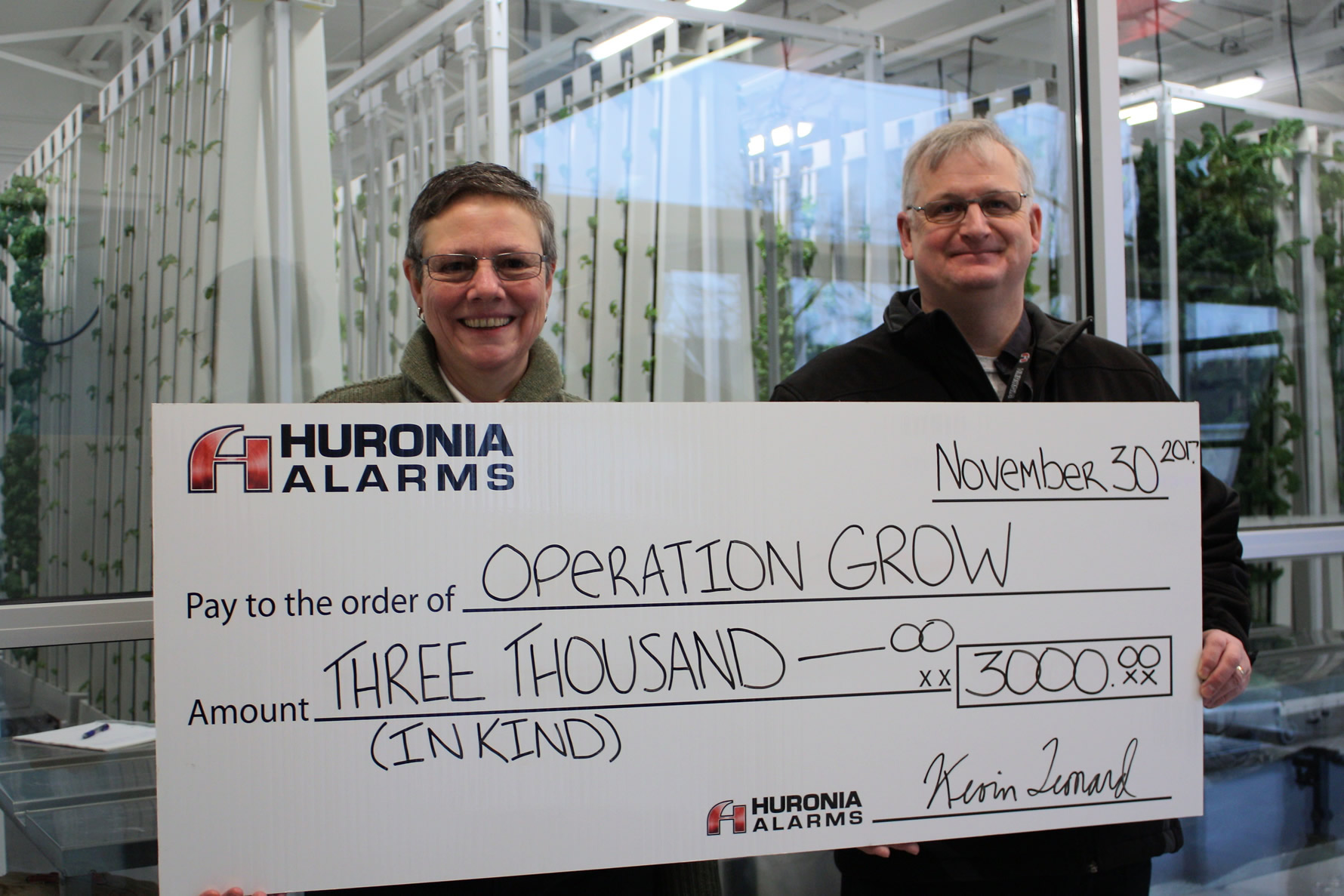 Huronia Alarm & Fire Security Inc. makes donation-in-kind to Operation Grow